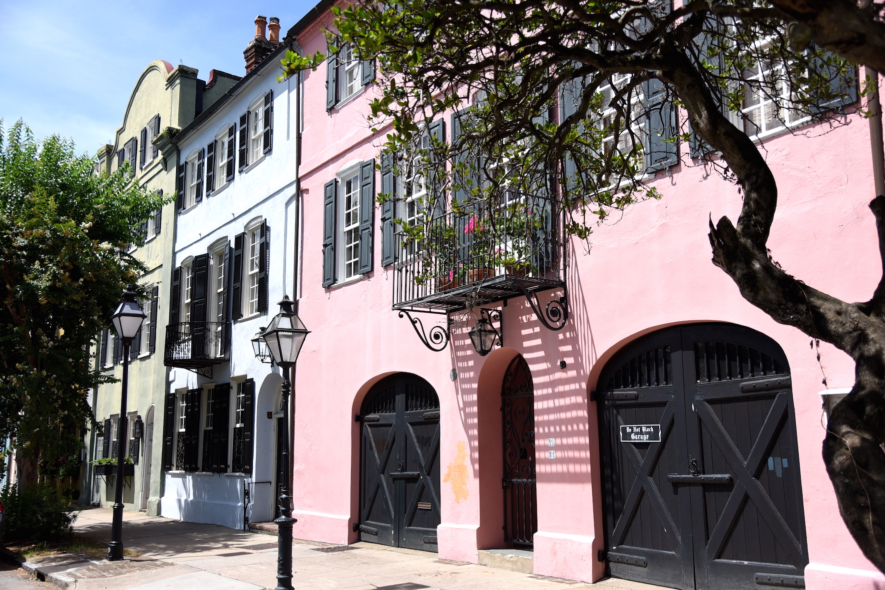 Pink pastel houses of the Rainbow Row in Charleston, USA